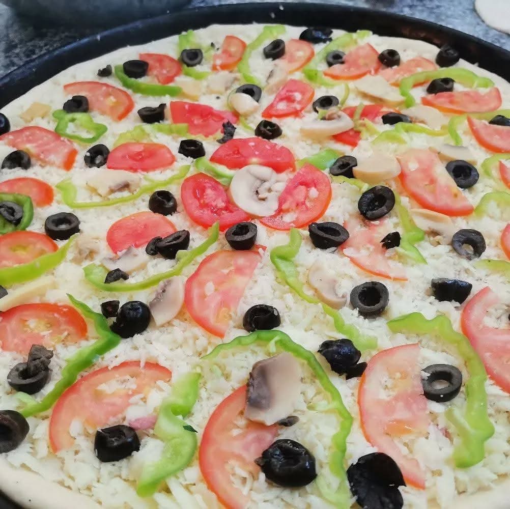 بيتزا ومعجنات الراوي